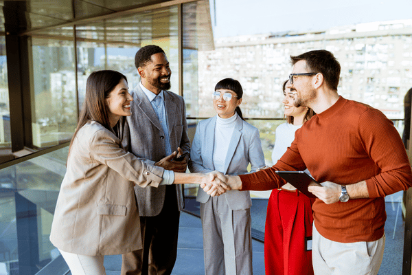 Professionals shaking hands. Study Business Management at Oxford International Career Colleges in Vancouver.