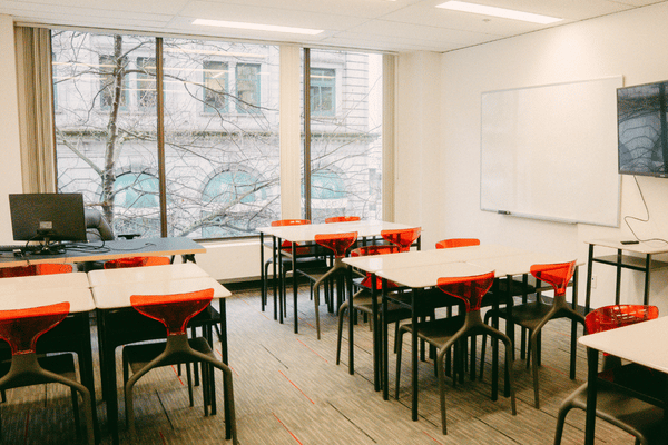 OICC Vancouver campus classroom with red chairs