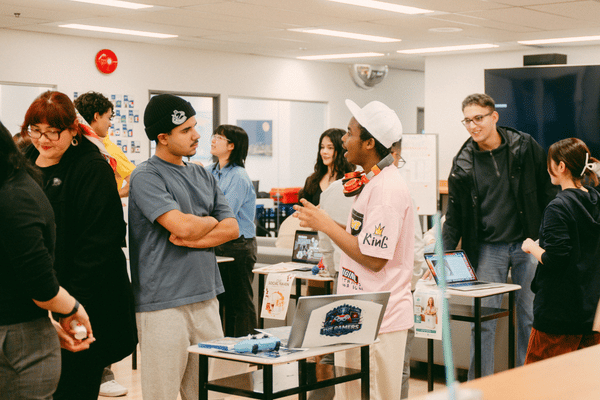 OICC Vancouver campus Eagles Nest with students presenting their course projects in Vancouver